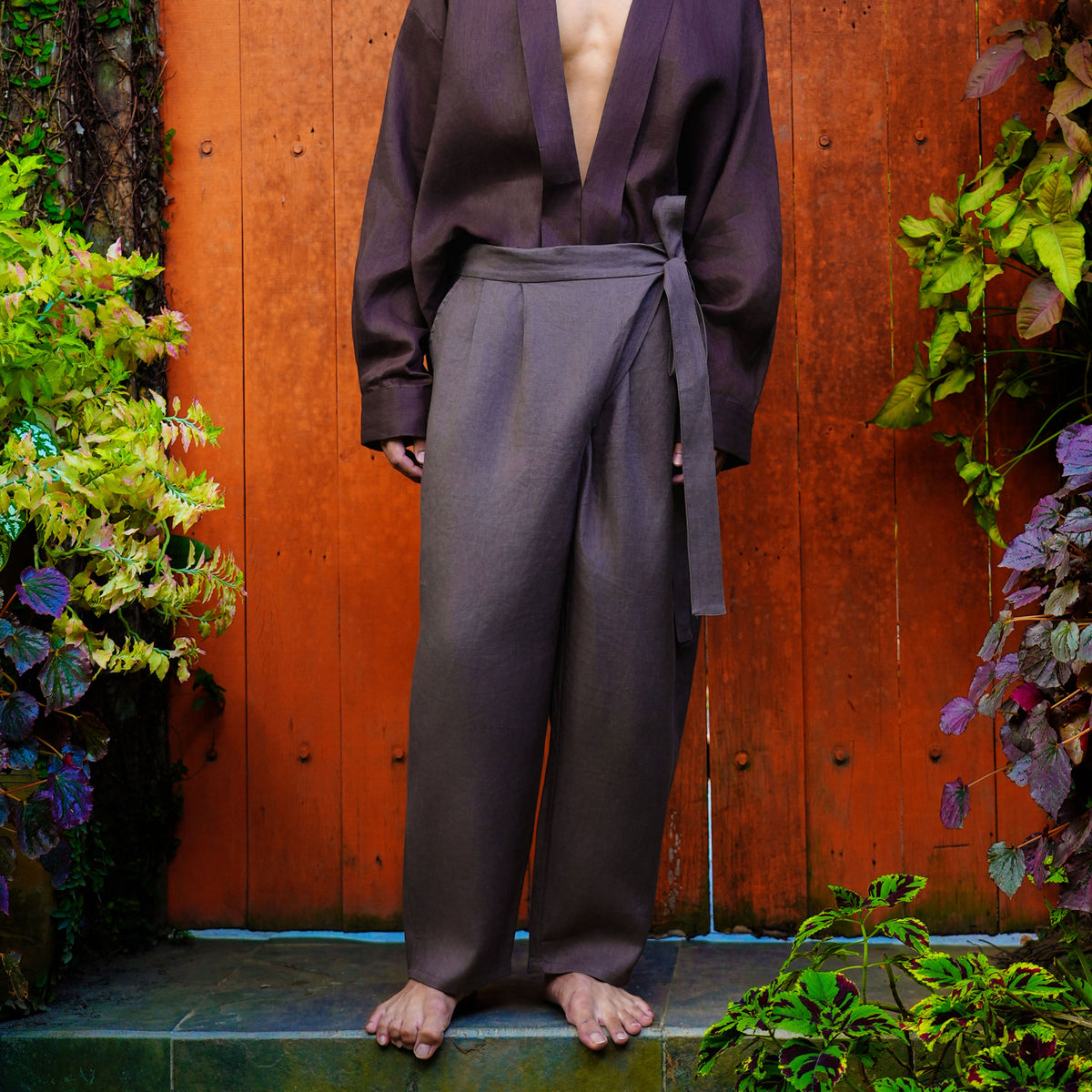 Syomsz Bujang chocolate linen trousers, back view