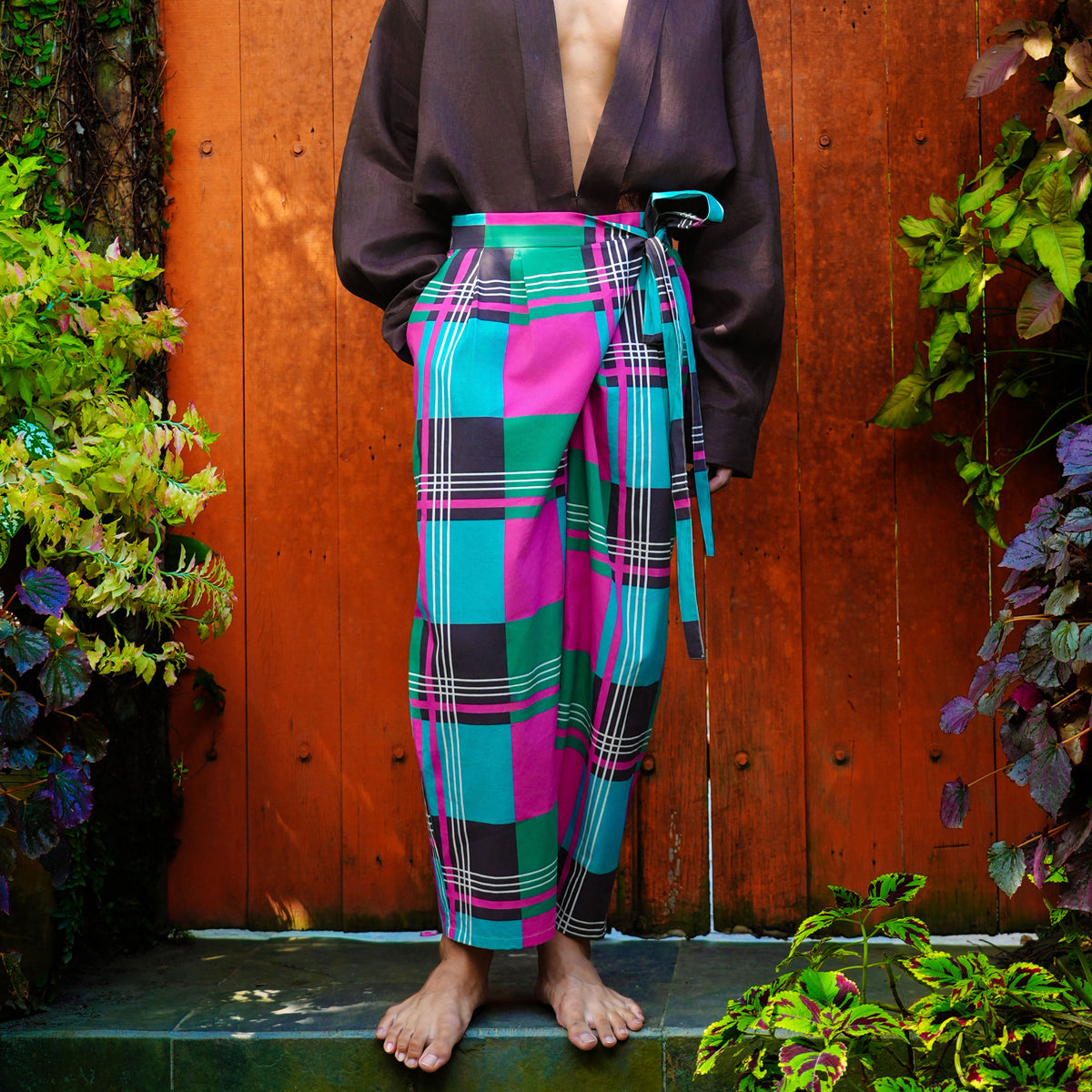 Syomsz Bujang sarong-style trousers in pelikat print, front view