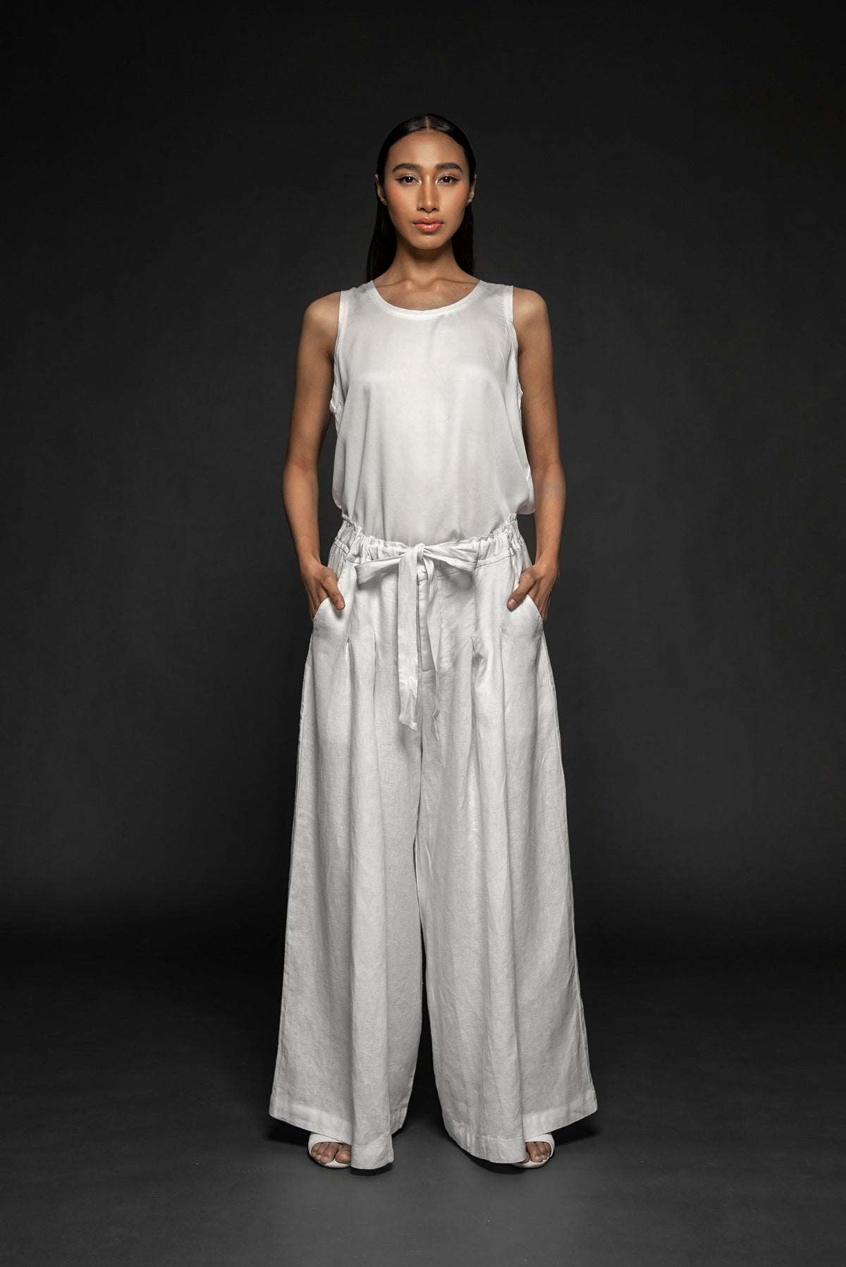 Syomsz Dhoti wide-leg linen pants in white, front view