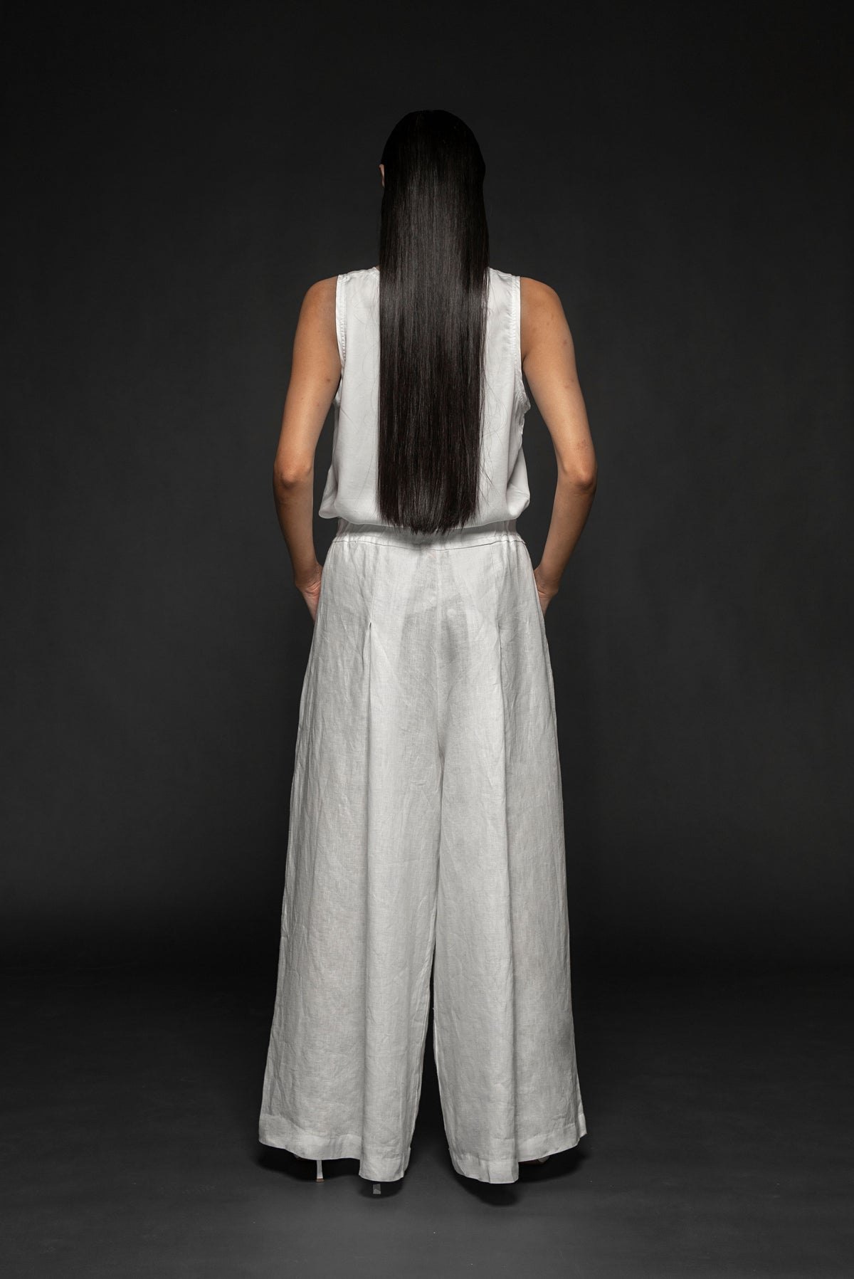 Syomsz Dhoti wide-leg linen pants in white, side view