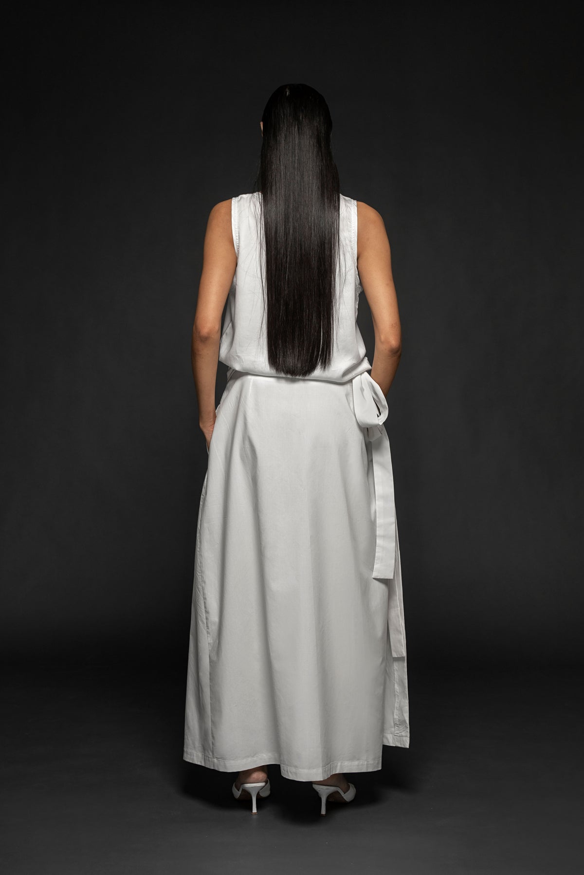 Syomsz Sulu pleated wrap skirt in milk, side view
